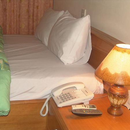 Eastgate Hotel Acra Quarto foto
