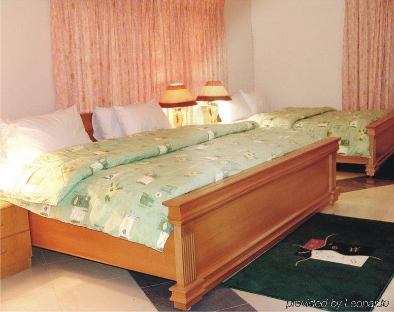 Eastgate Hotel Acra Quarto foto